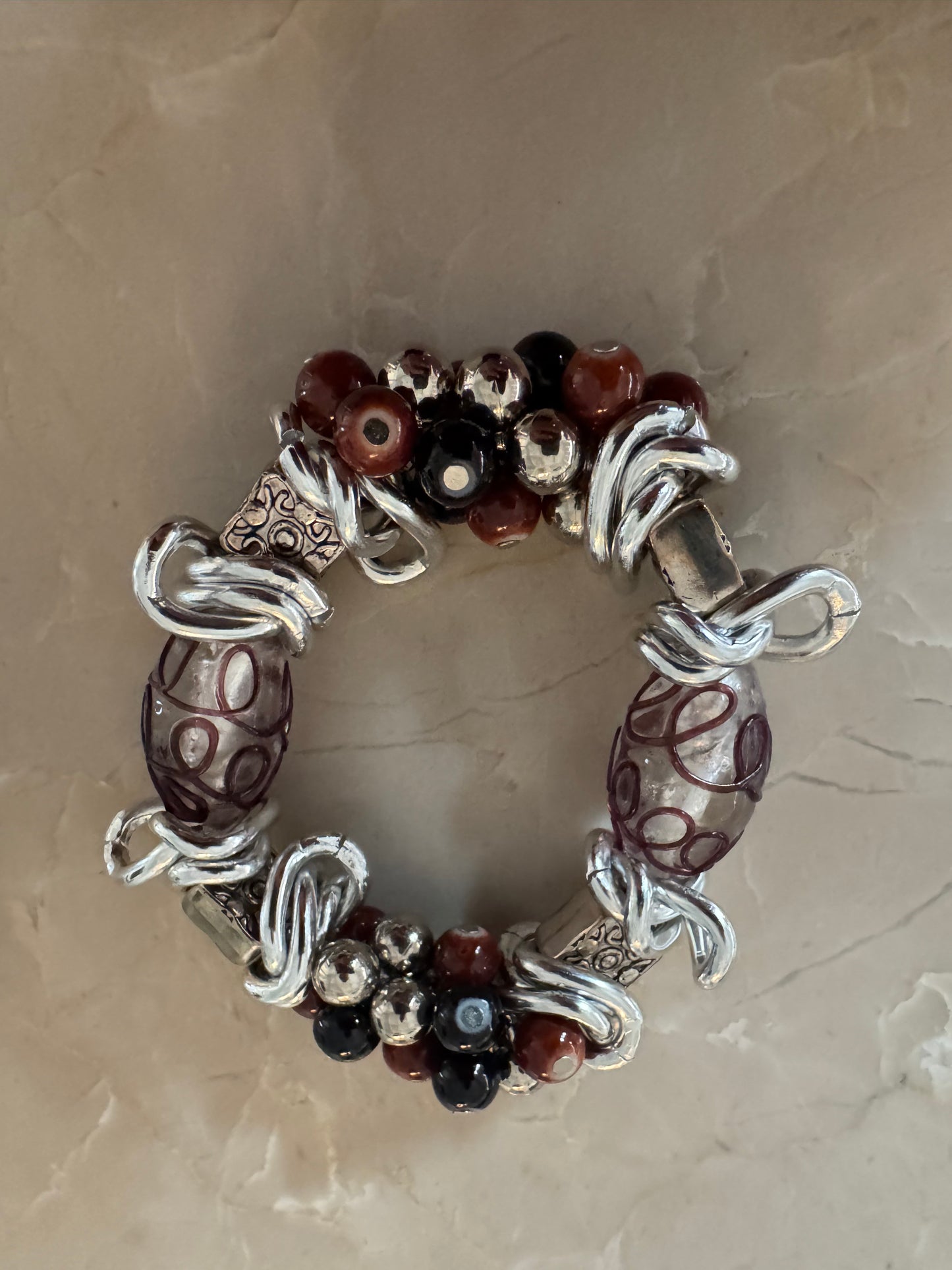 Mixed-Media Statement Bracelet with Sculptural Charms