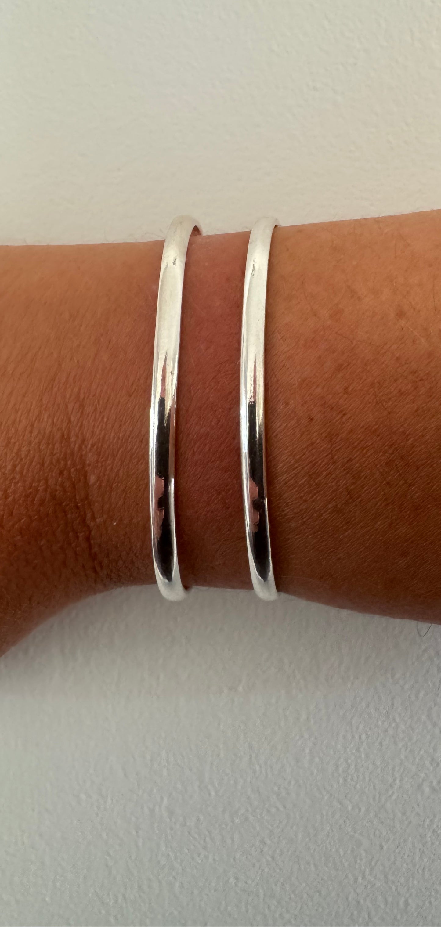 Bracelet manchette double bande en argent poli