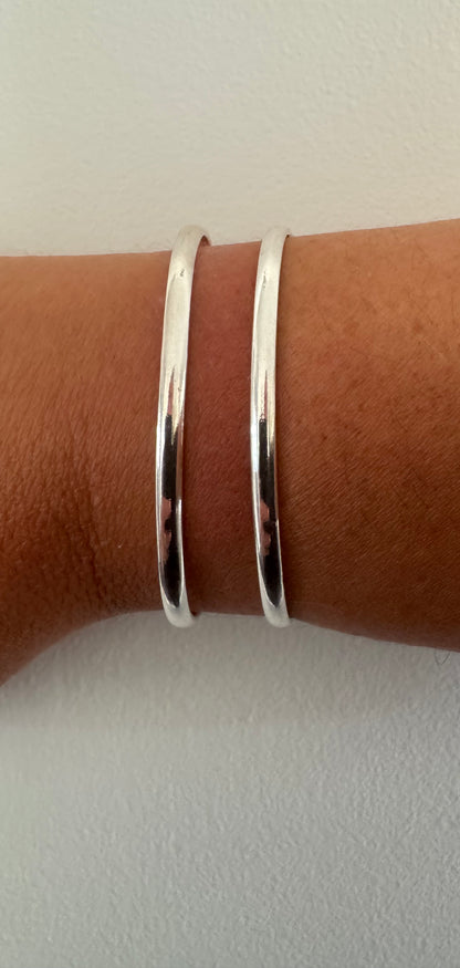 Bracelet manchette double bande en argent poli